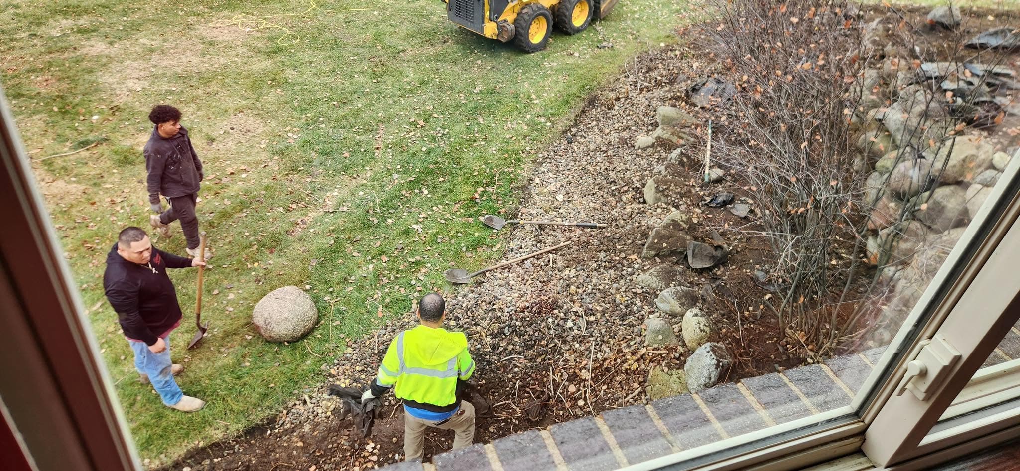 Overhead view of the Ramos crew building a rock bed