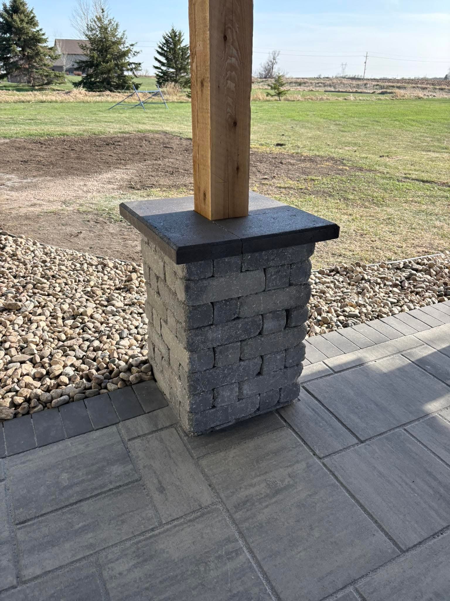 Patio pillar at the lawn edge
