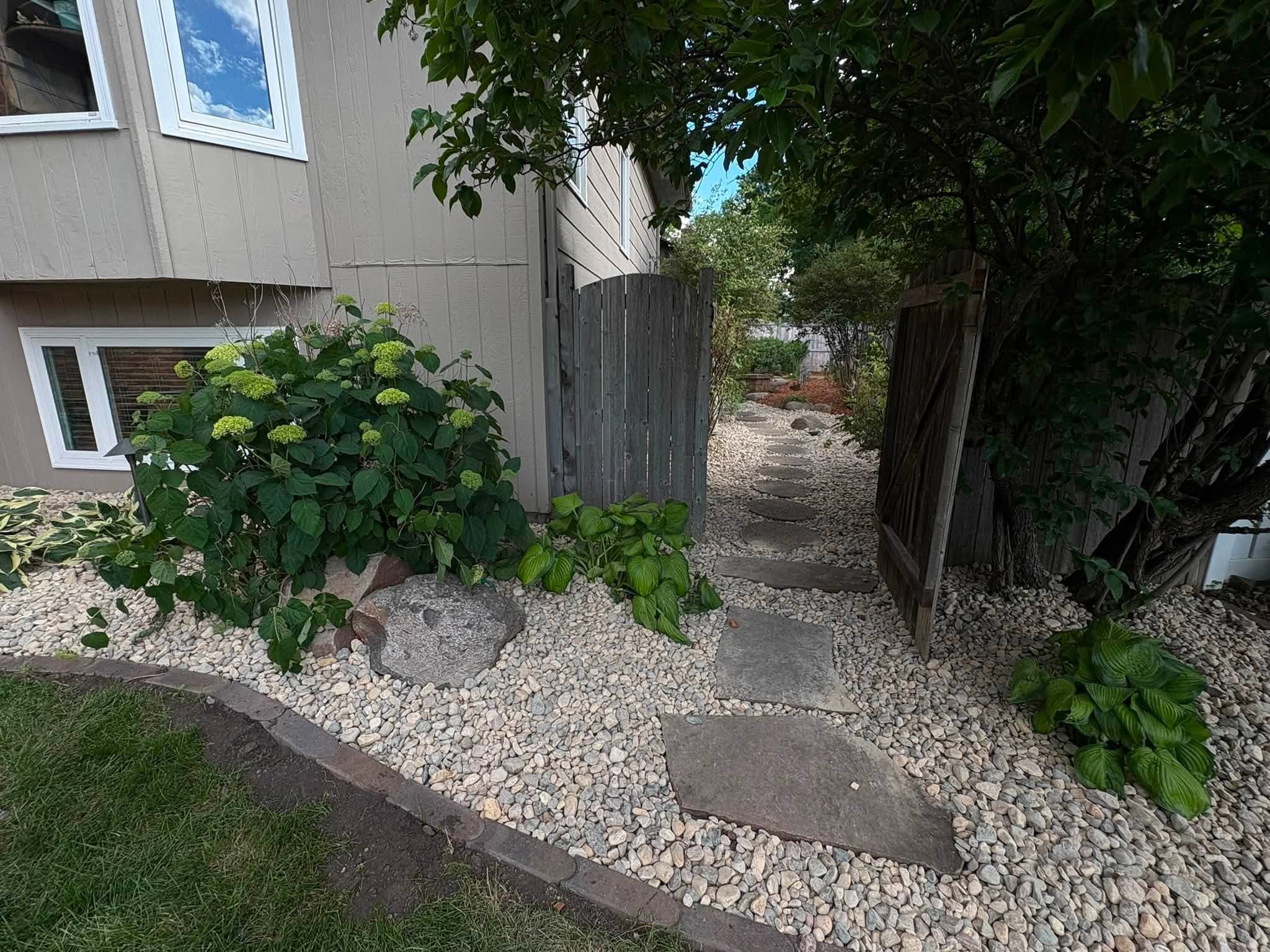 Foundation rock bed with shrubs