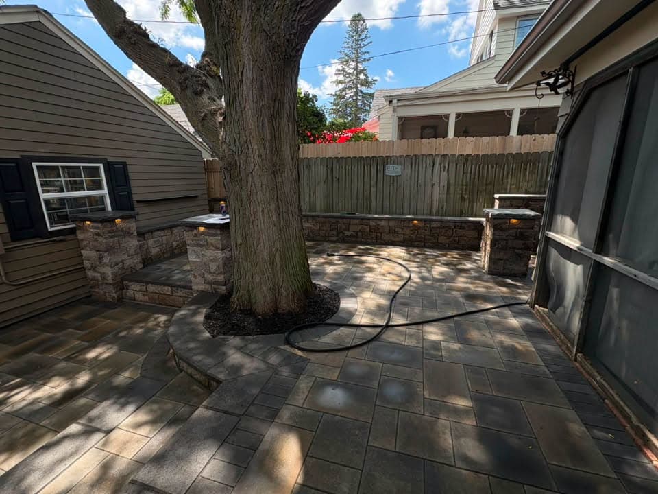 Seat wall patio built around a mature tree