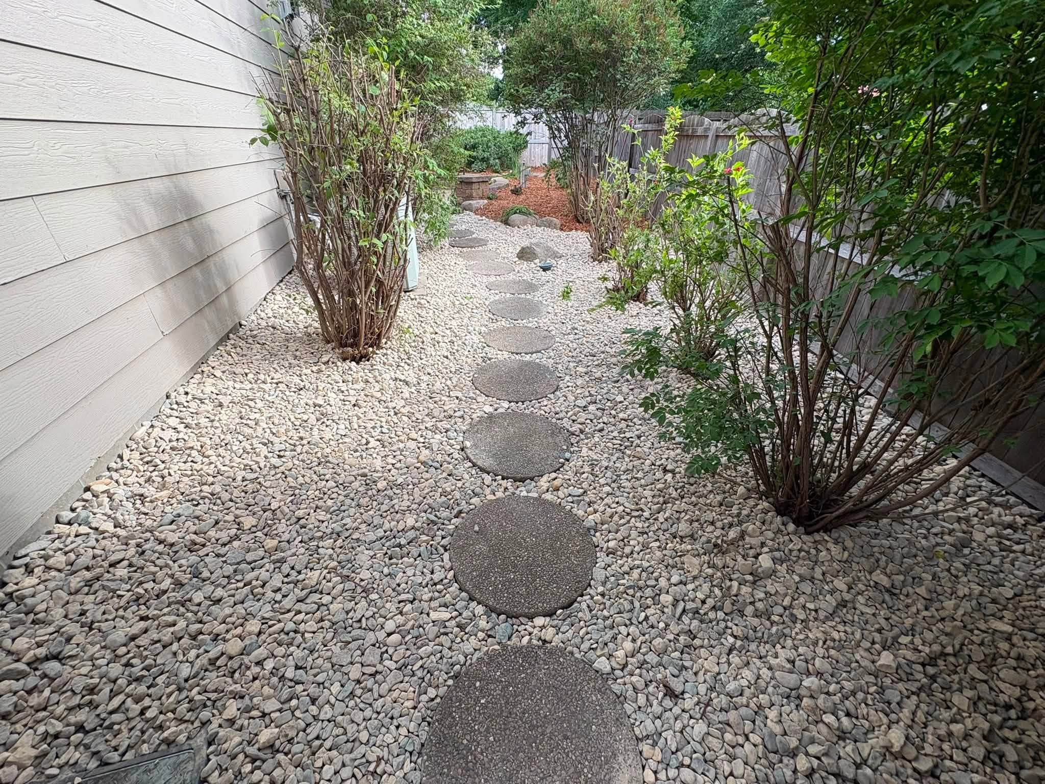 Stepping stone path set through river rock